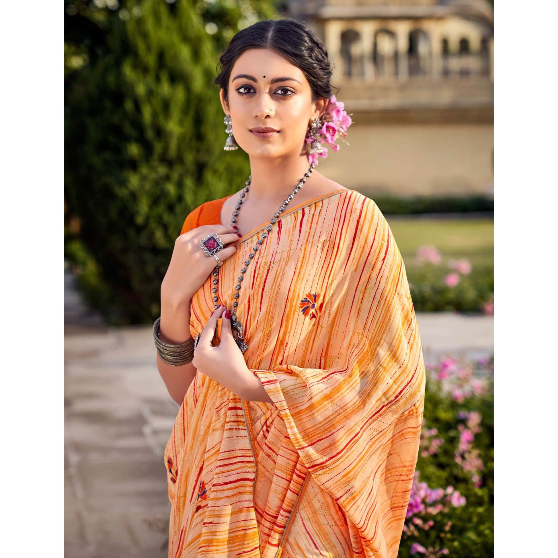 Light Orange Printed Raw Silk Saree With Fancy Border