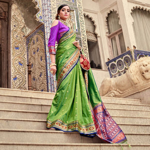 green-woven-pure-silk-saree-with-with-tassels