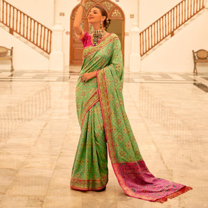 green-patola-printed-banarasi-silk-saree-with-tassels