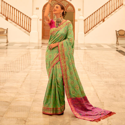 green-patola-printed-banarasi-silk-saree-with-tassels