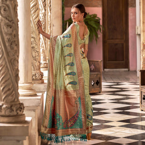 Chikoo Floral Woven Banarasi Silk Saree With Tassels