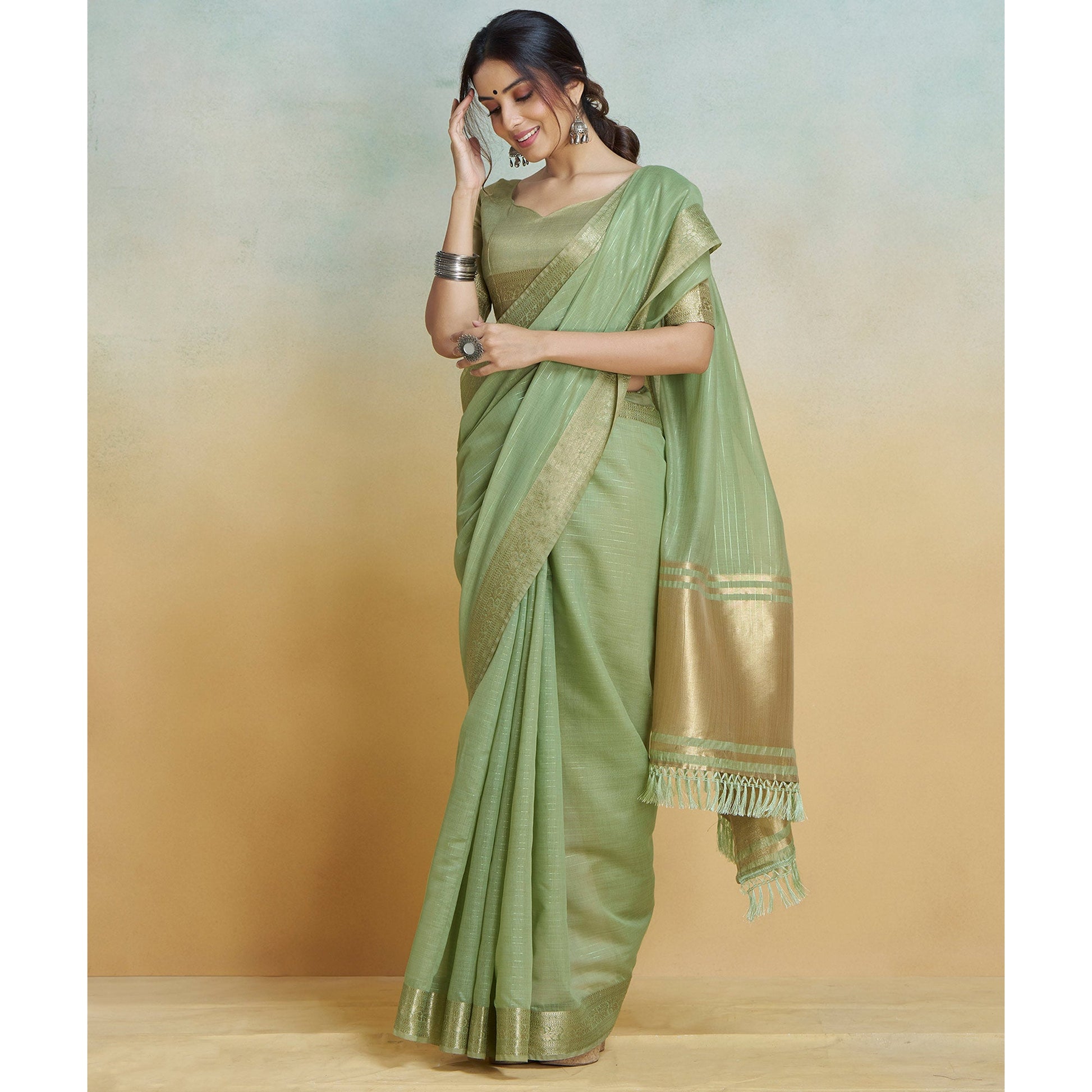 green-woven-cotton-silk-saree-with-tassels-19
