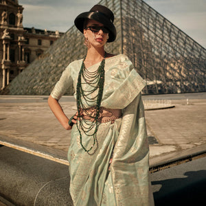 green-floral-woven-art-silk-saree-with-tassels