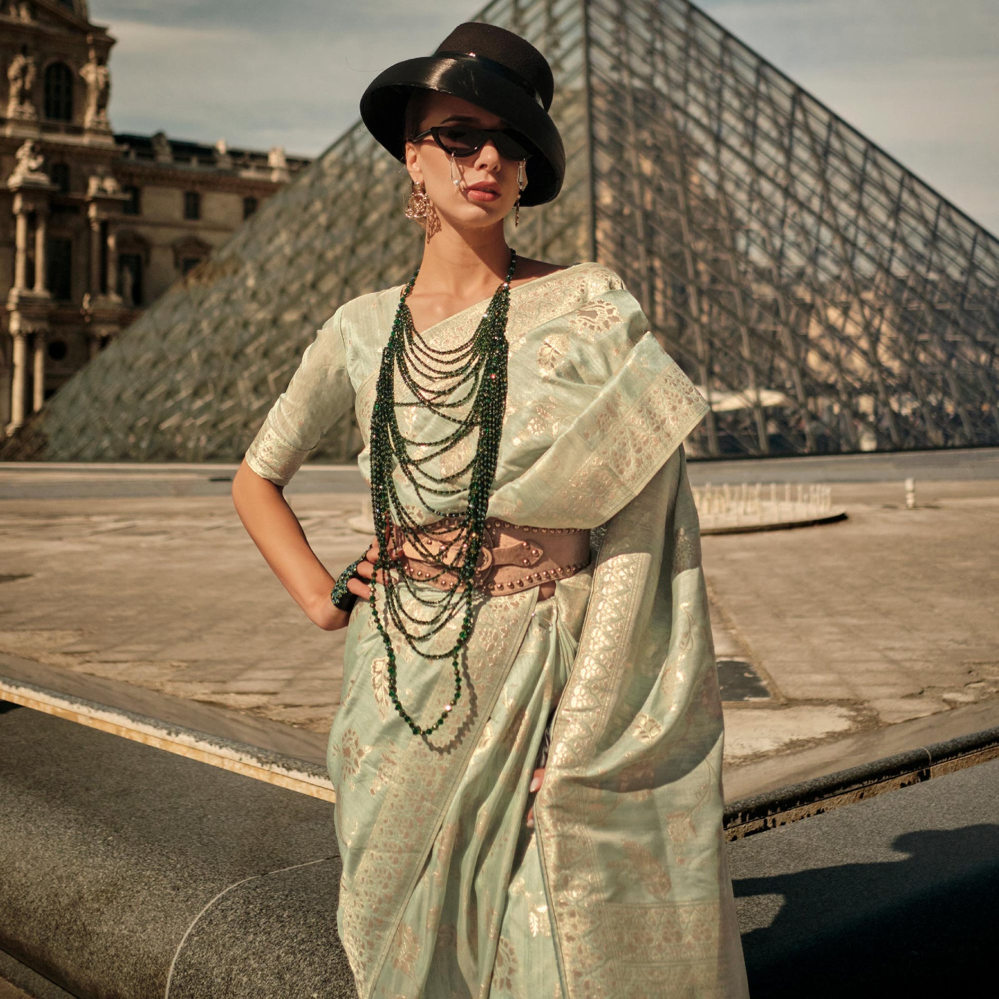 green-floral-woven-art-silk-saree-with-tassels