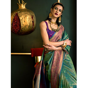 green-floral-woven-art-silk-saree-with-tassels-2