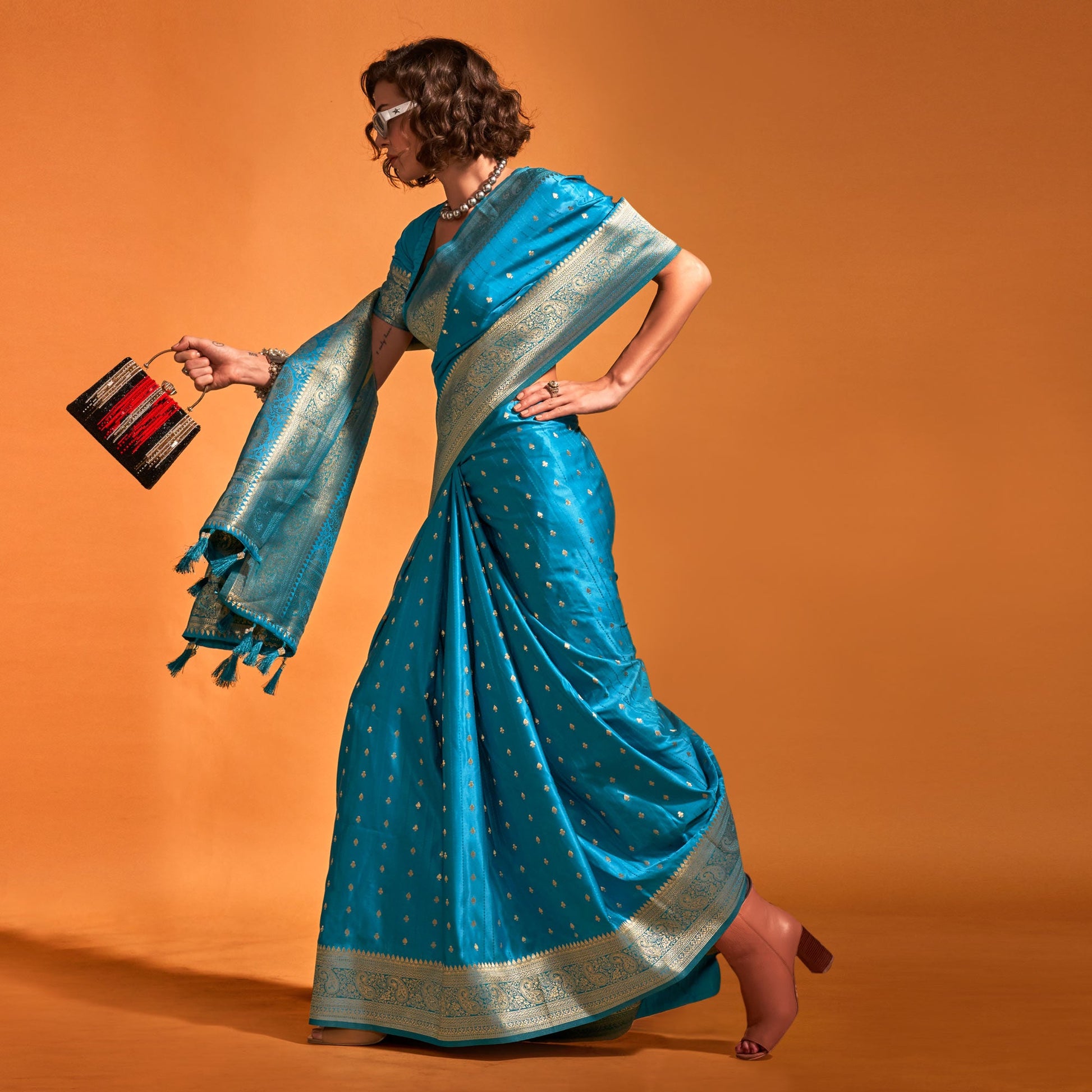 Blue Woven Zari Border Satin Saree With Tassels