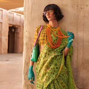 green-floral-printed-tissue-saree-with-tassels