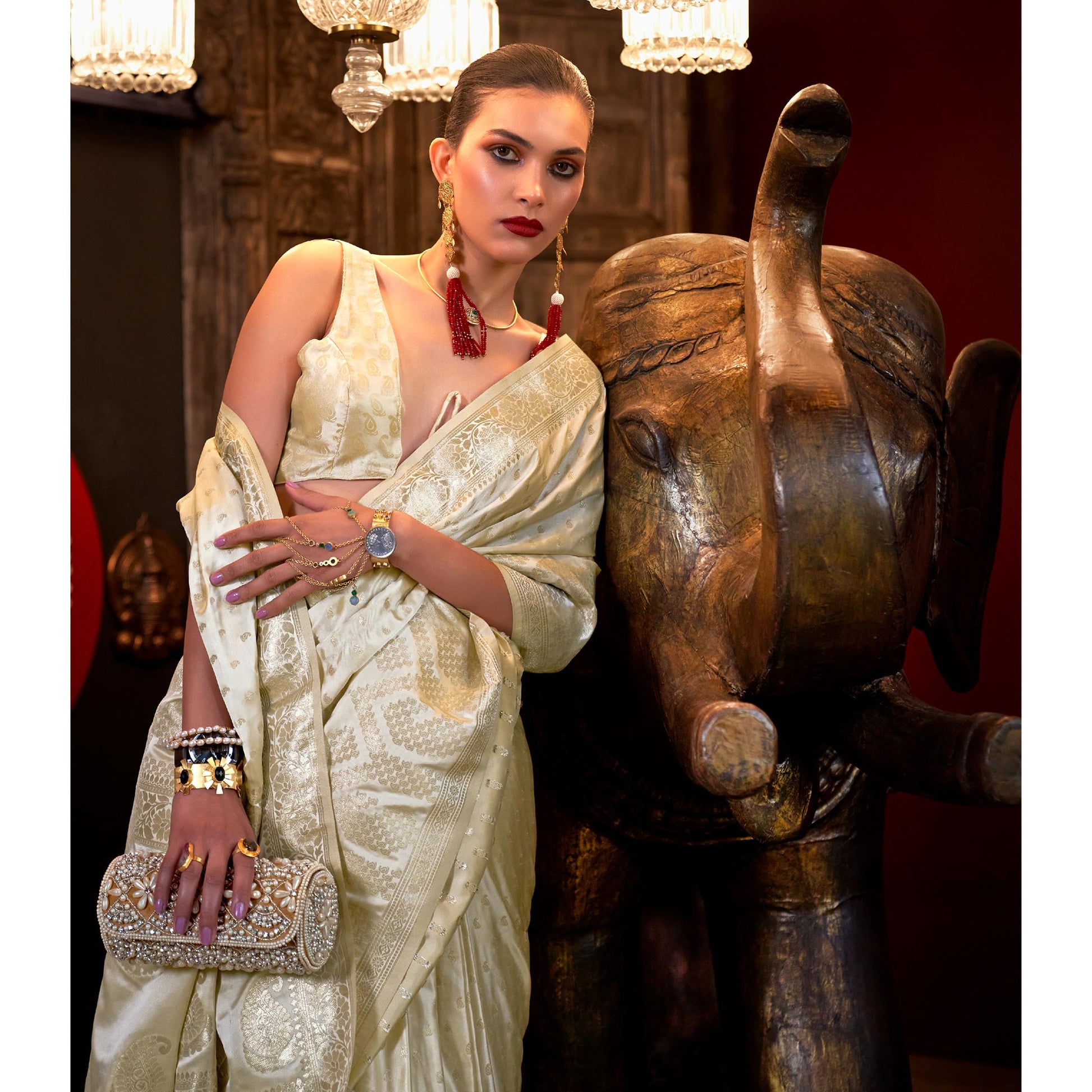 Cream Woven Satin Saree With Tassels