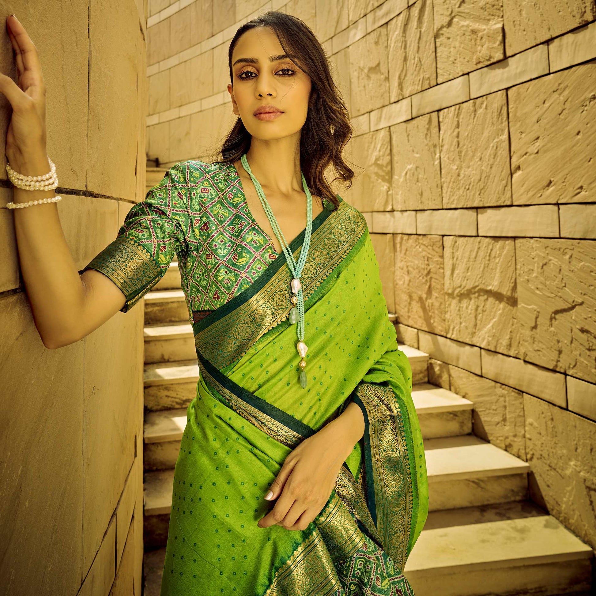 green-weaved-patola-tussar-silk-saree-with-tassels