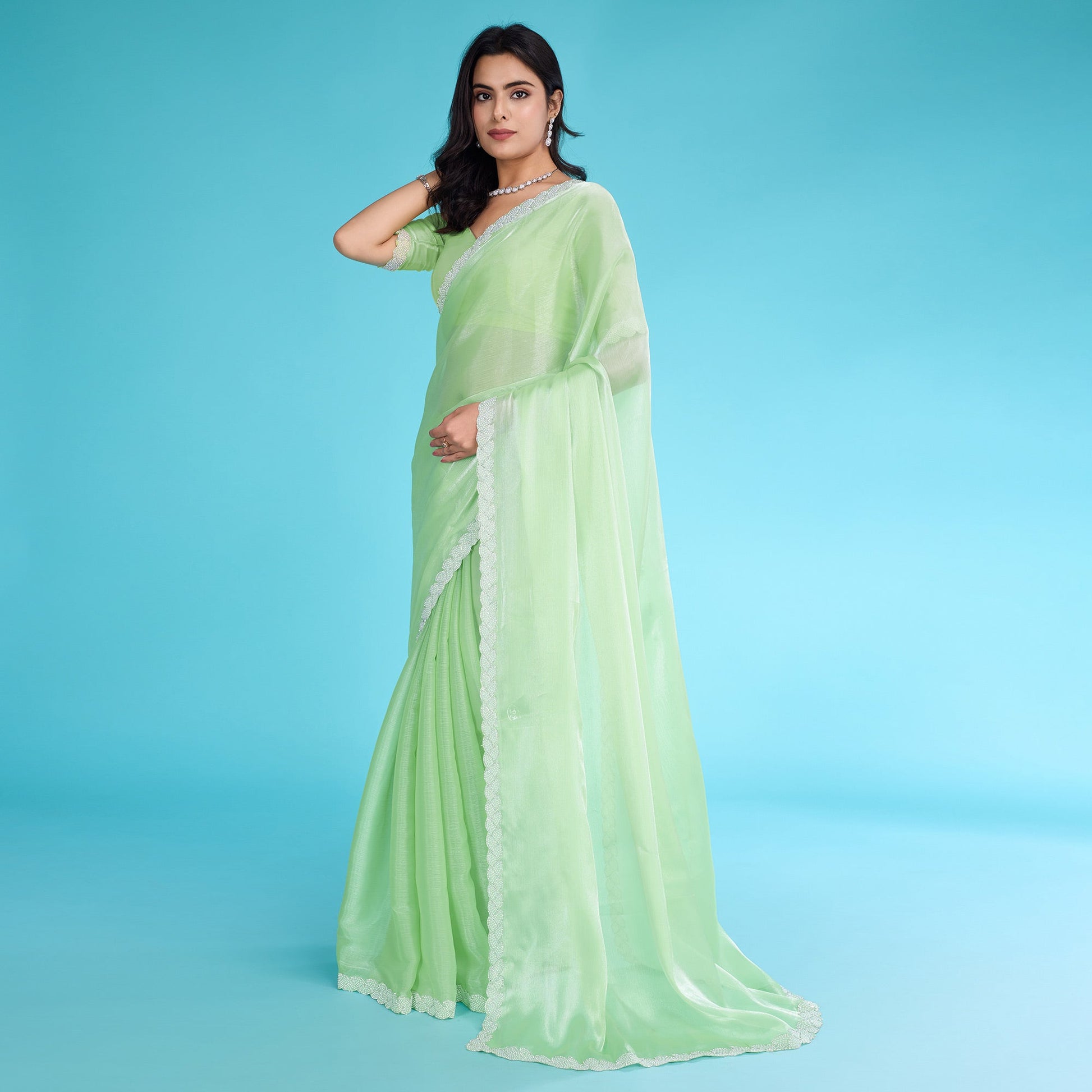 green-solid-with-zarkan-ceramic-pearl-diamond-lace-tissue-saree