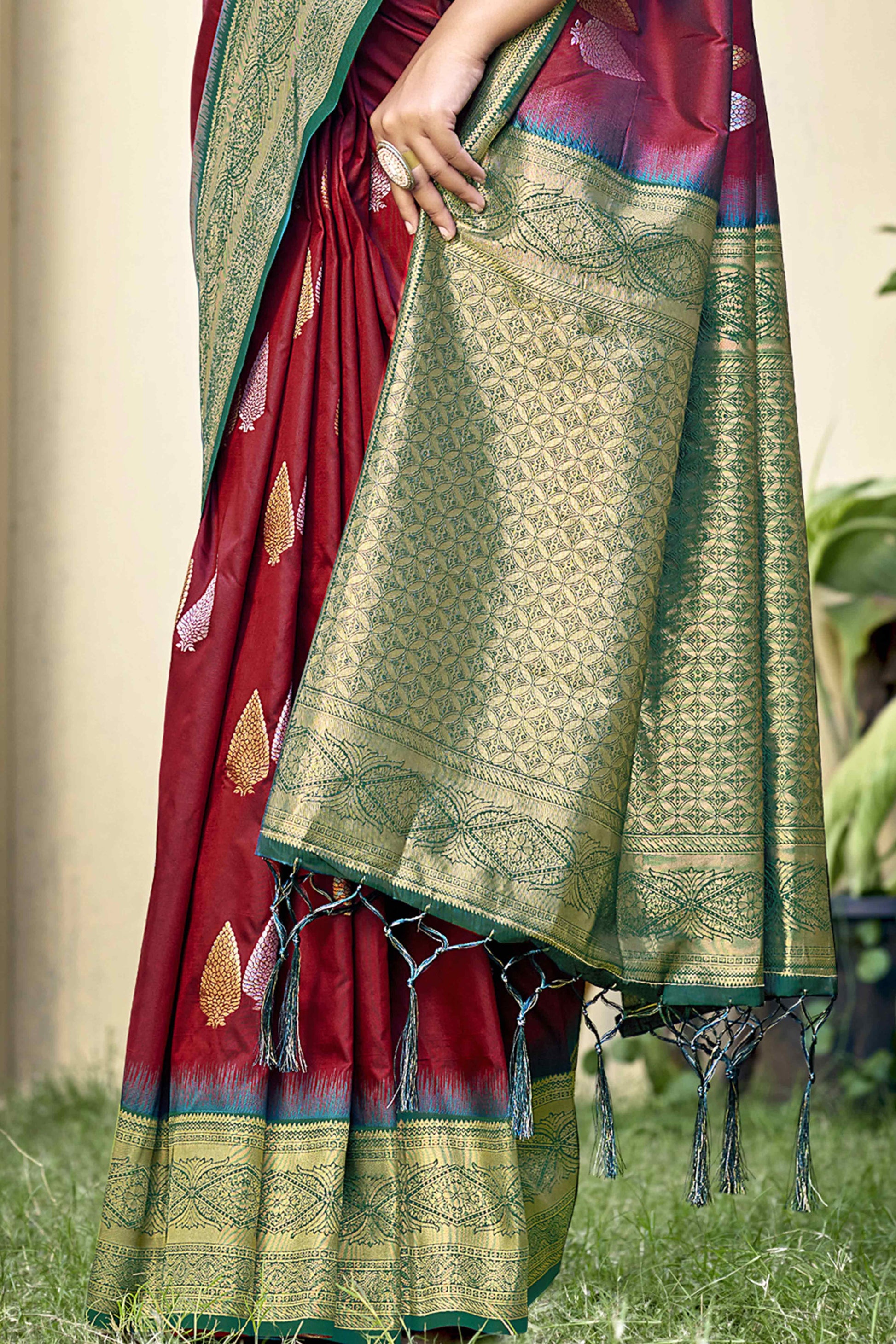 Maroon Woven Banarasi Silk Saree With Tassels