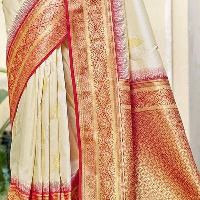 Cream Woven Banarasi Silk Saree With Tassels