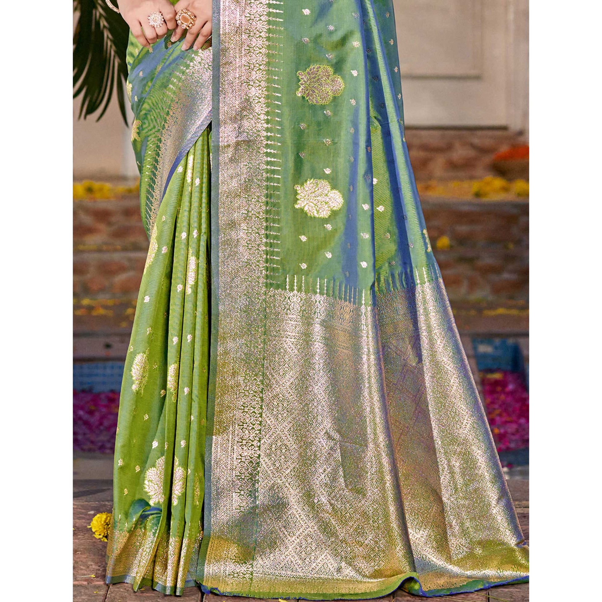 green-floral-woven-banarasi-silk-saree-with-tassels-12