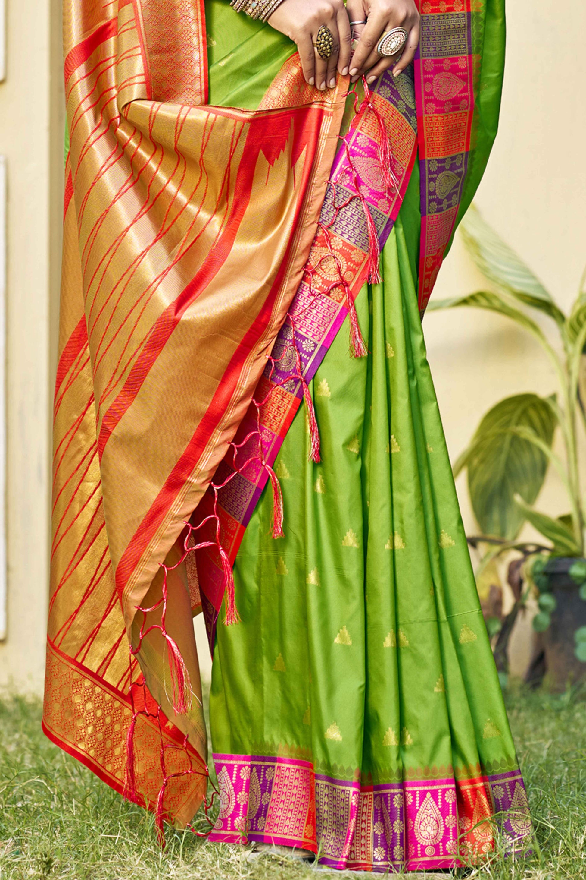 green-woven-banarasi-silk-saree-with-tassels-17