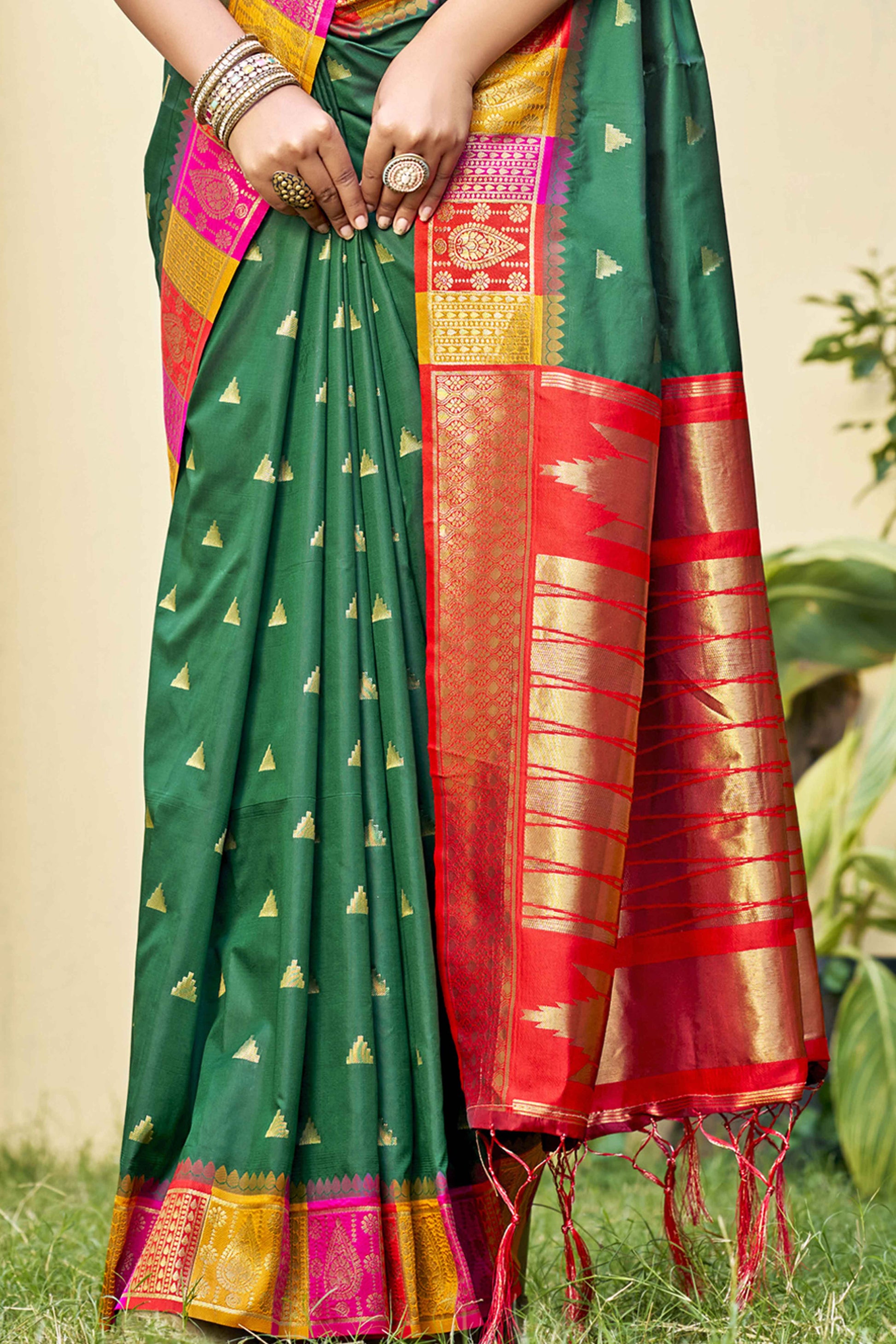 green-woven-banarasi-silk-saree-with-tassels-21