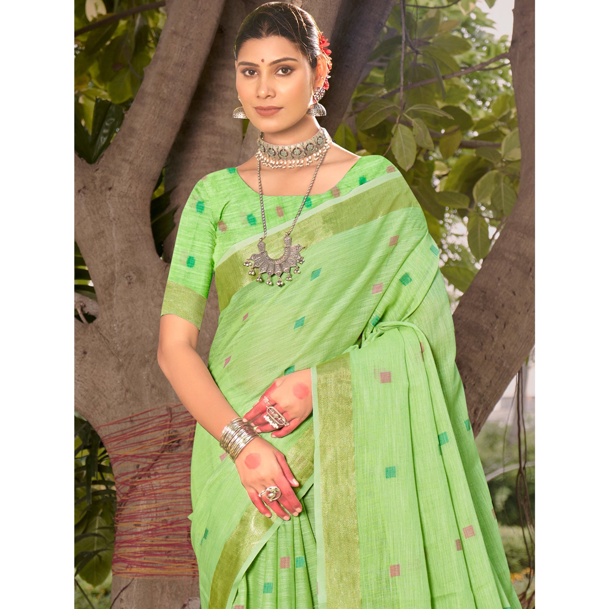 green-woven-cotton-blend-saree-with-tassels-3