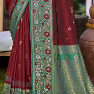 Maroon Floral Woven Banarasi Silk Saree With Tassels