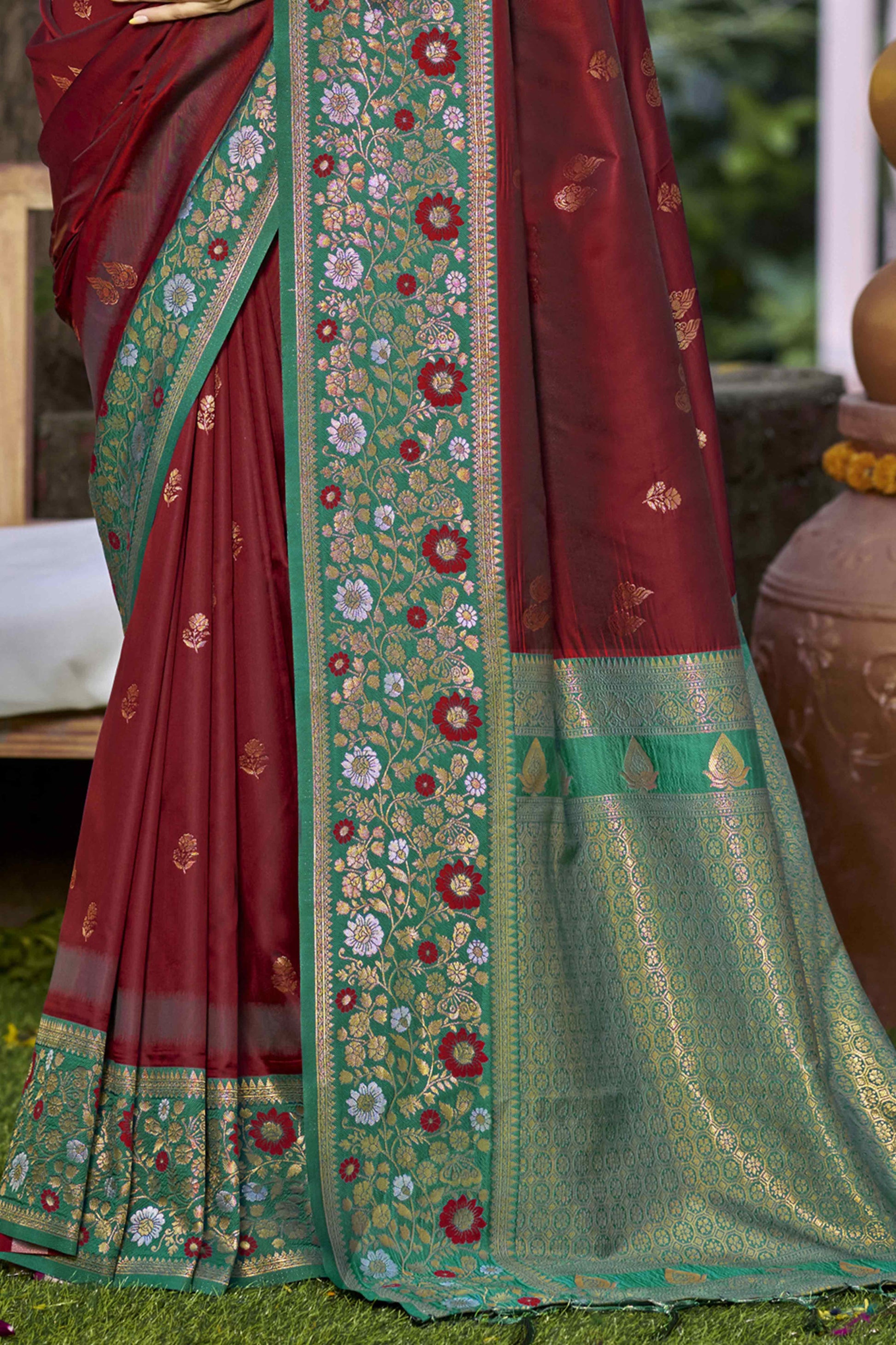 Maroon Floral Woven Banarasi Silk Saree With Tassels