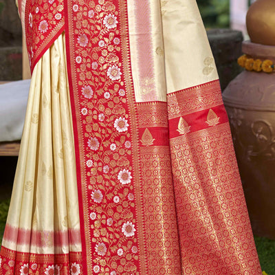 Cream Floral Woven Banarasi Silk Saree With Tassels