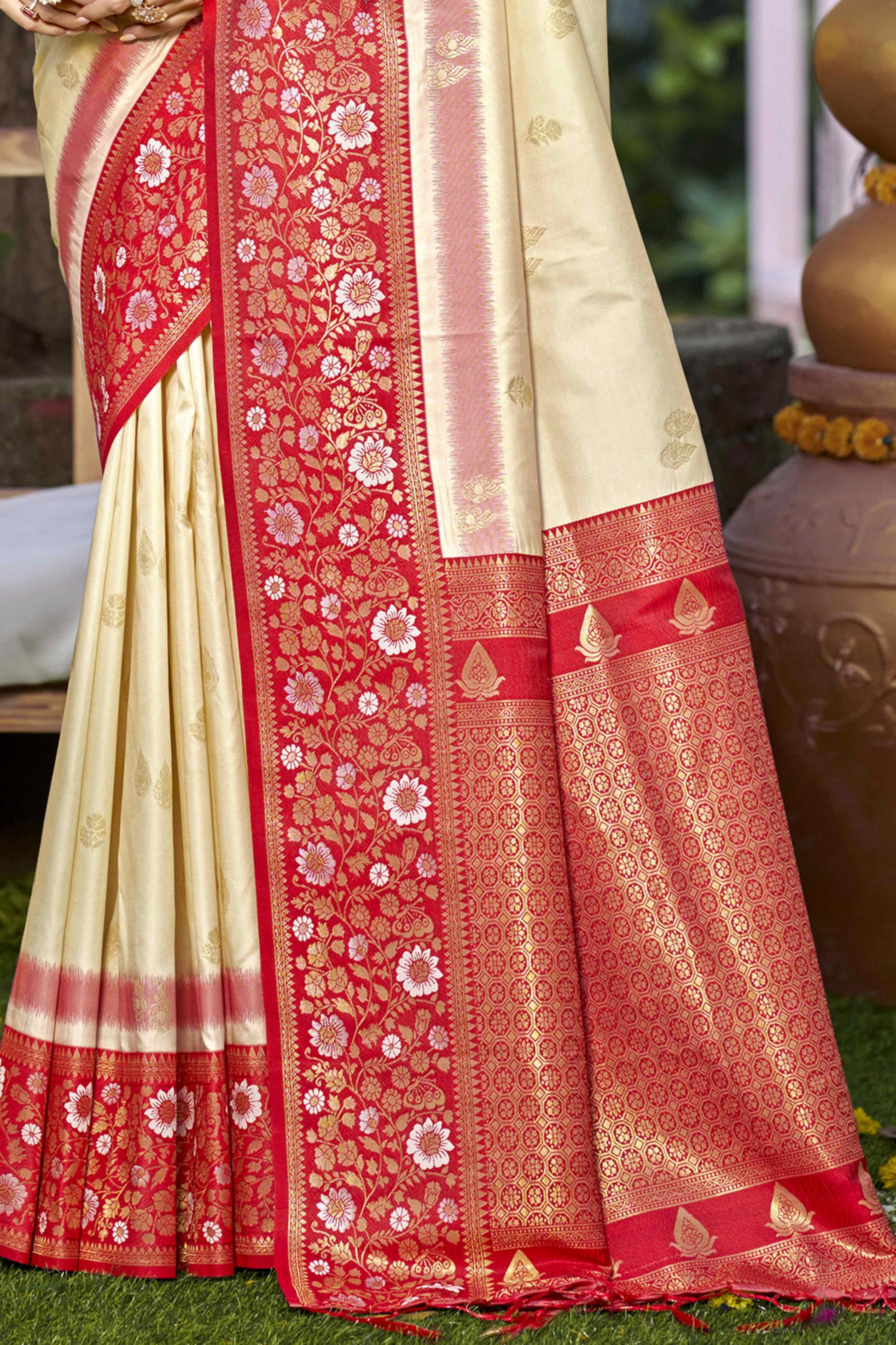 Cream Floral Woven Banarasi Silk Saree With Tassels