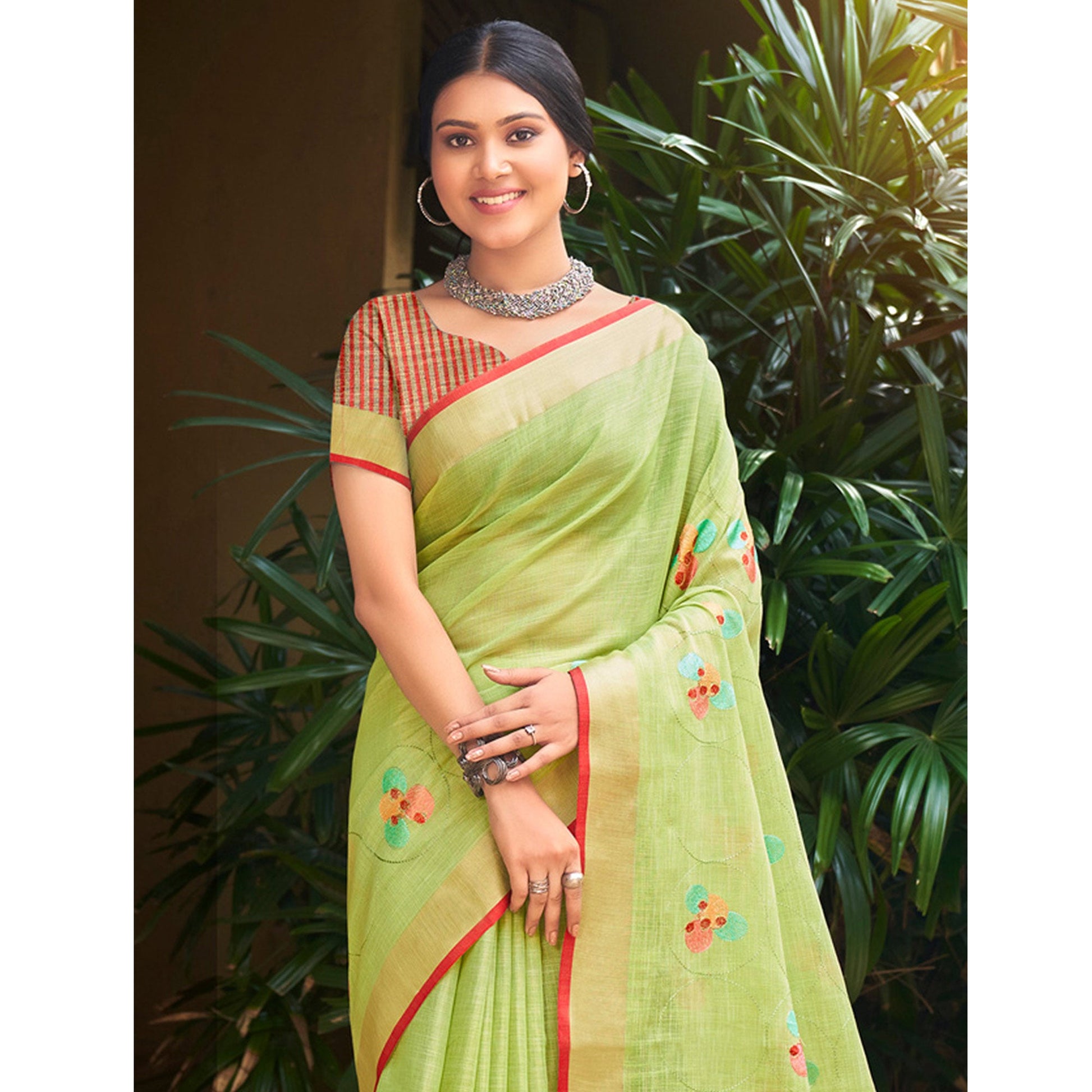 green-floral-embroidered-linen-saree-with-tassels-1