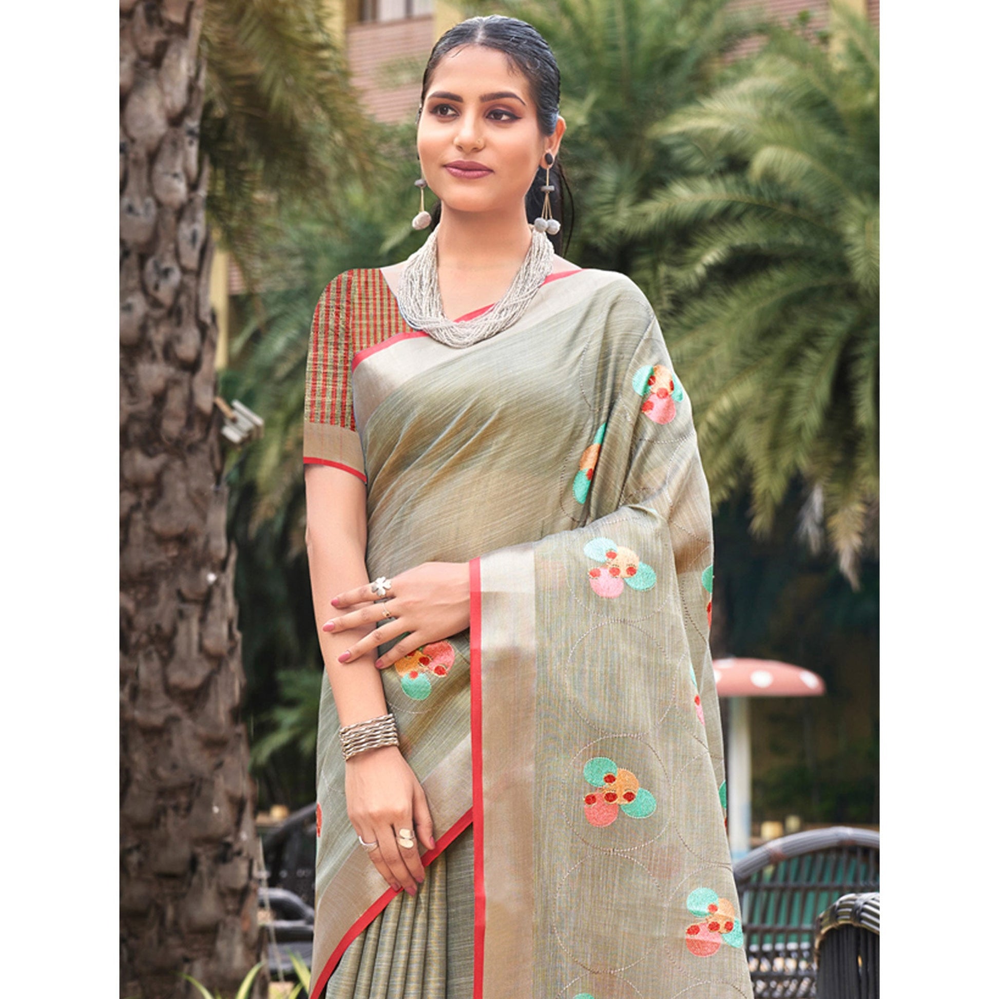grey-floral-embroidered-linen-saree-with-tassels
