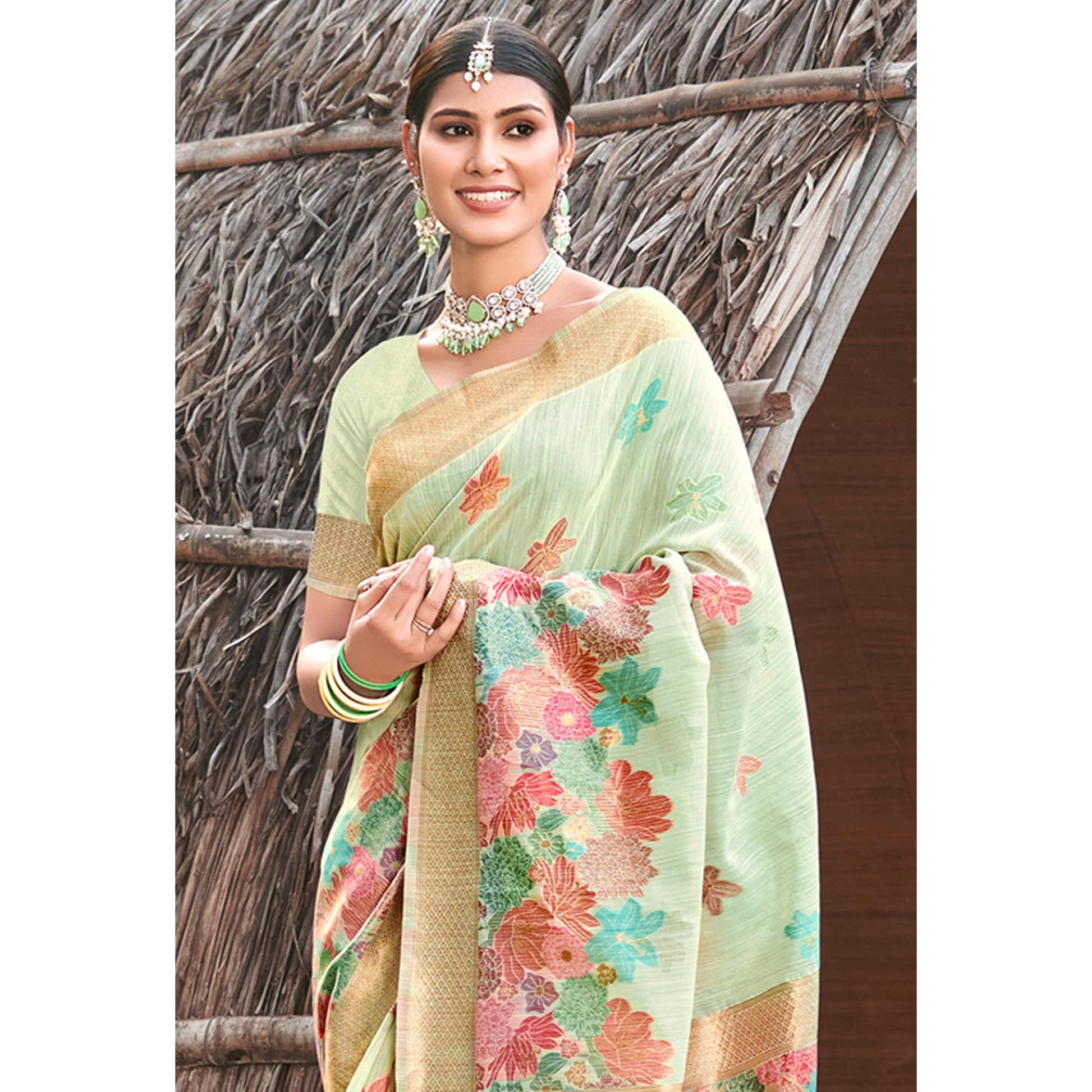 green-woven-cotton-blend-saree-with-tassels-1