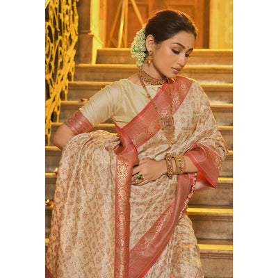 Cream & Peach Floral Woven Banarasi Silk Saree With Tassels