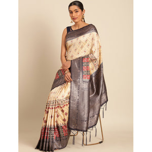 Cream Woven Banarasi Silk Saree With Tassels