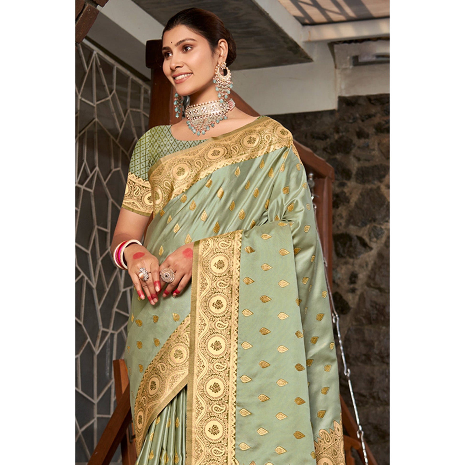 Light Green Woven Satin Silk Saree With Tassels