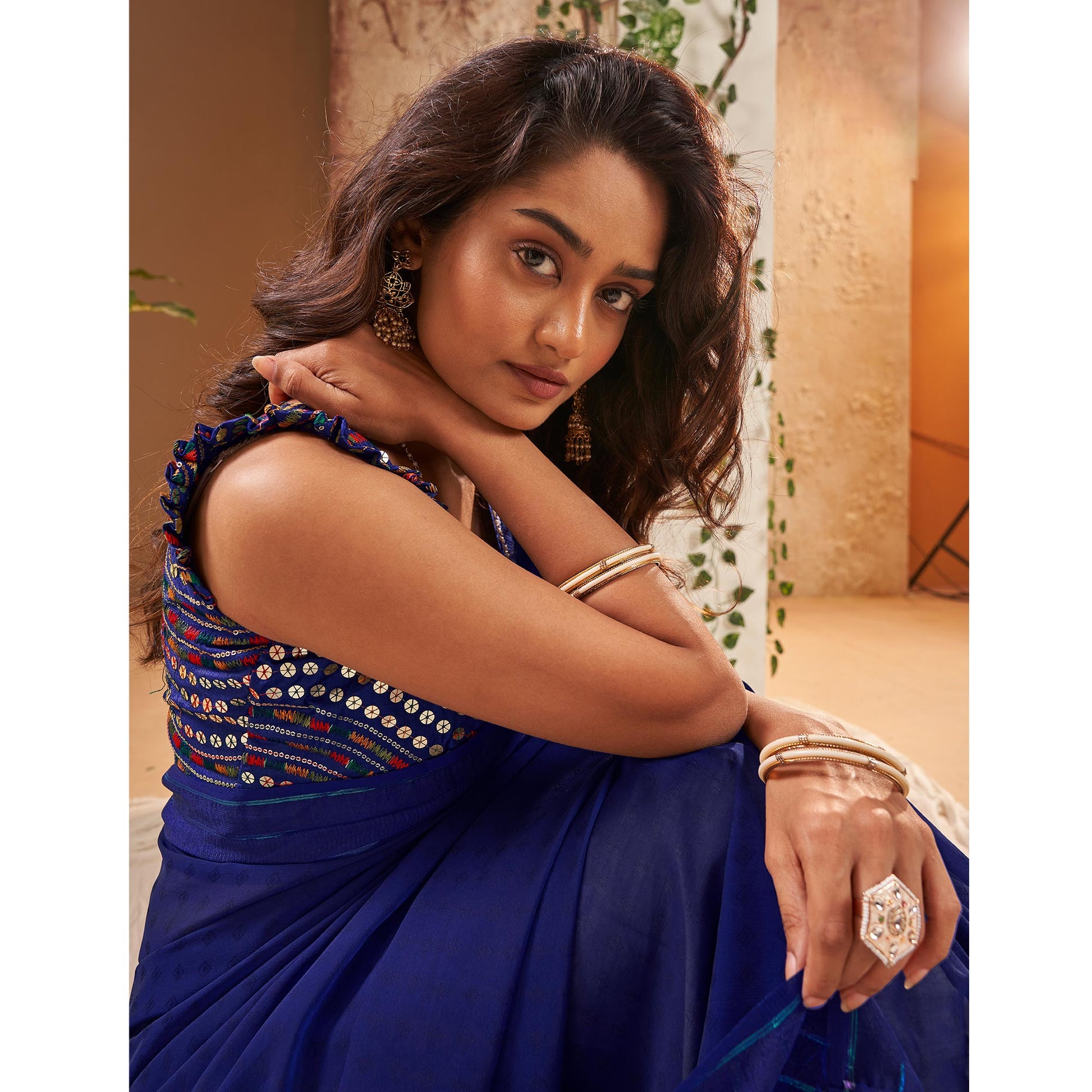 Blue Woven Georgette Saree With Tassels