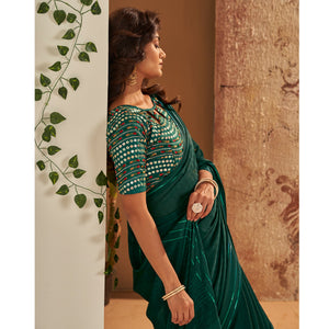 Dark Green Woven Georgette Saree With Tassels