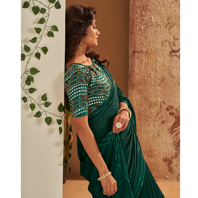 Dark Green Woven Georgette Saree With Tassels