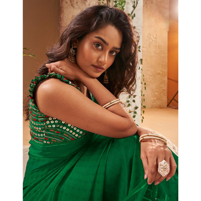 green-woven-georgette-saree-with-tassels-3