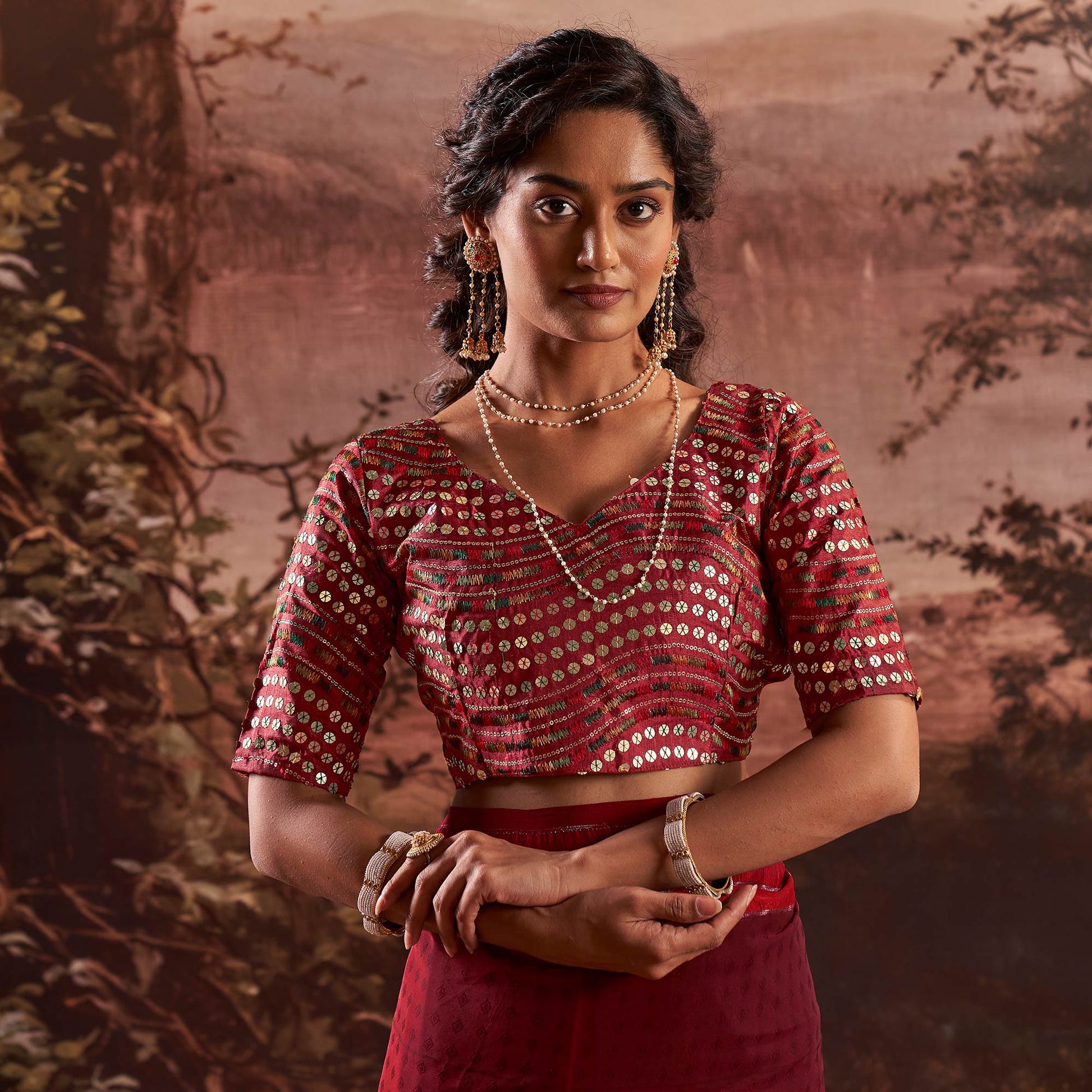 Maroon Woven Georgette Saree With Tassels