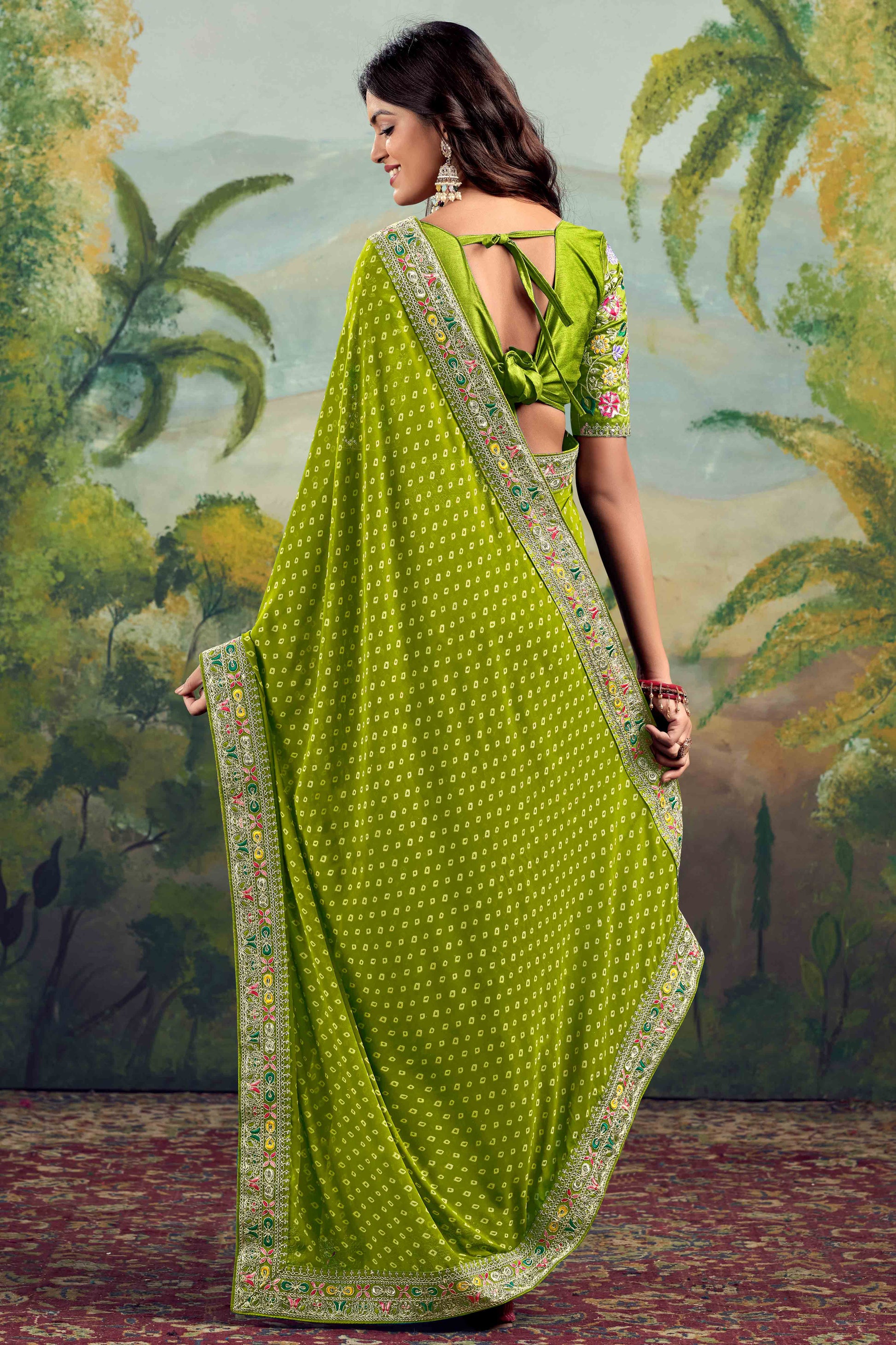 green-bandhani-printed-georgette-saree-with-embroidered-border