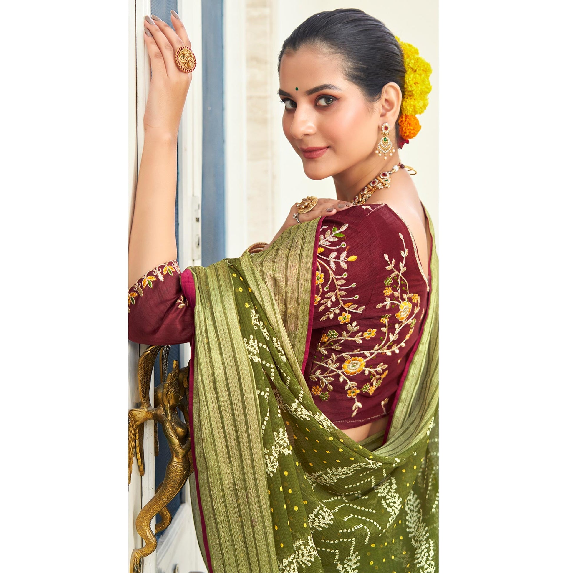 green-bandhani-printed-chiffon-saree-with-tassels