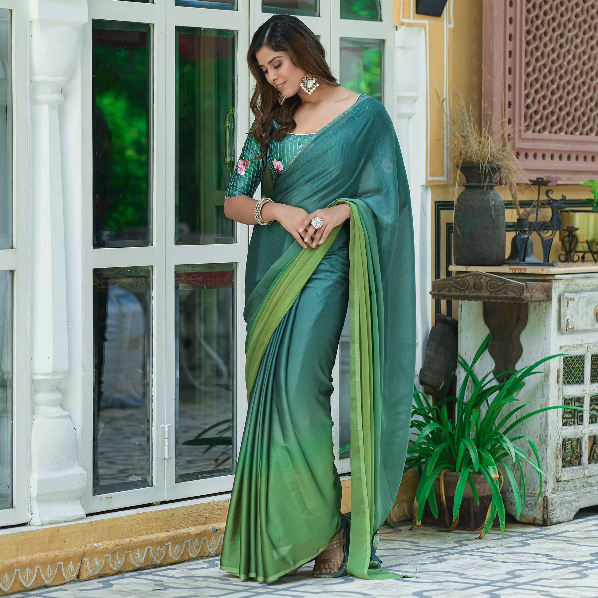 green-solid-chiffon-saree-with-tassels