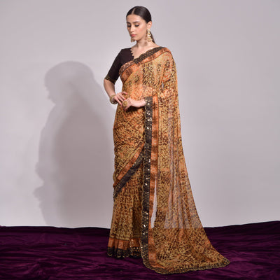 Brown Foil Printed Chiffon Saree With Embroidered Border