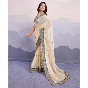 Cream Floral Sequins Embroidered Organza Saree With Lace Border