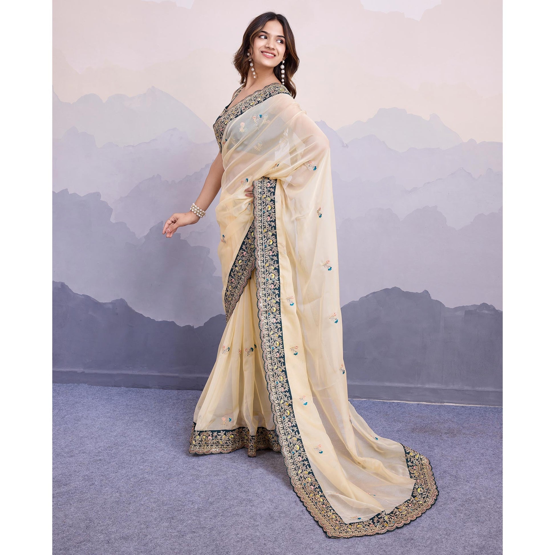 Cream Floral Sequins Embroidered Organza Saree With Lace Border