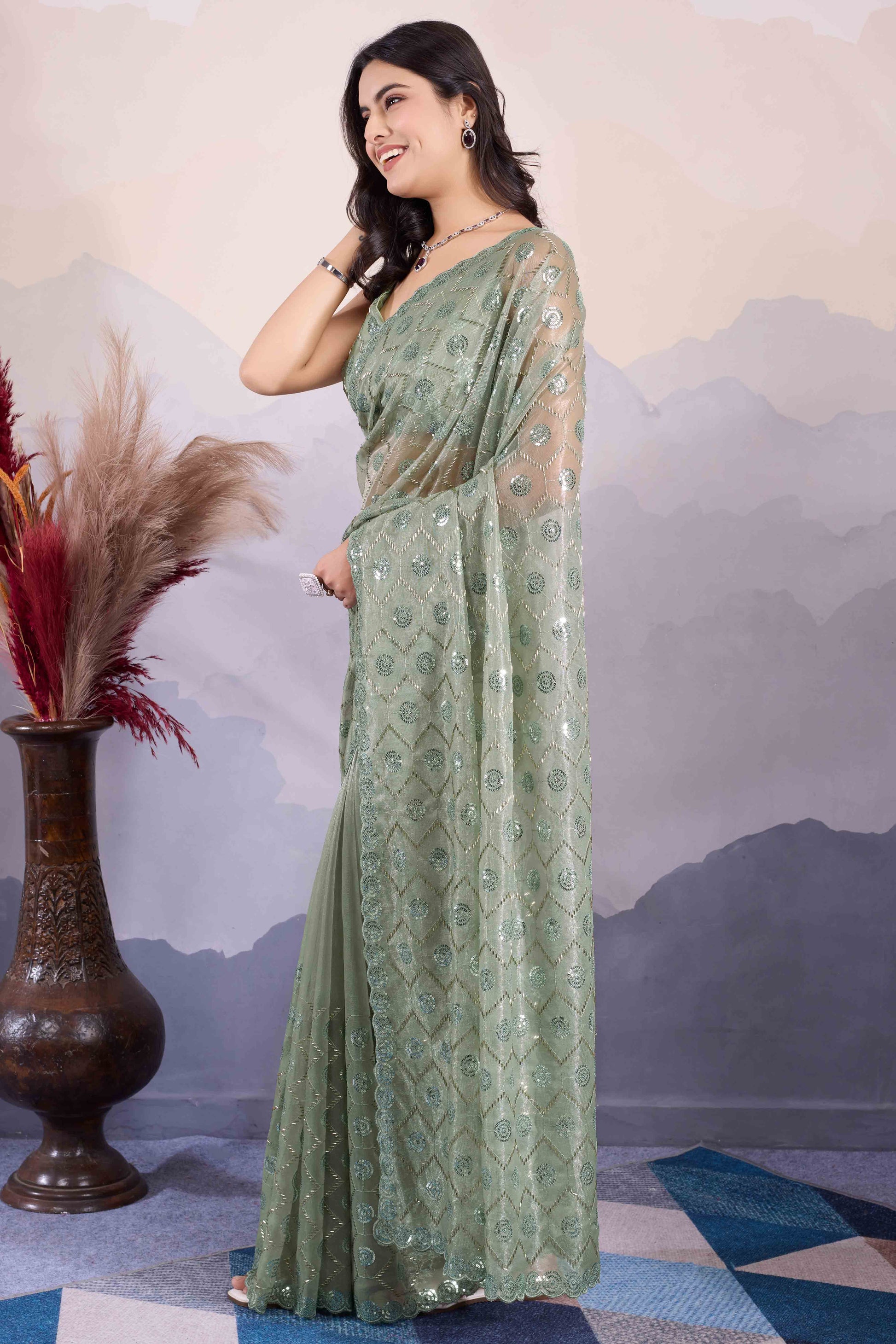 green-sequins-embroidered-twill-net-saree