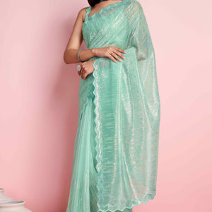 Foam Sea Green Sequins Embroidered Silver Twill Net Saree