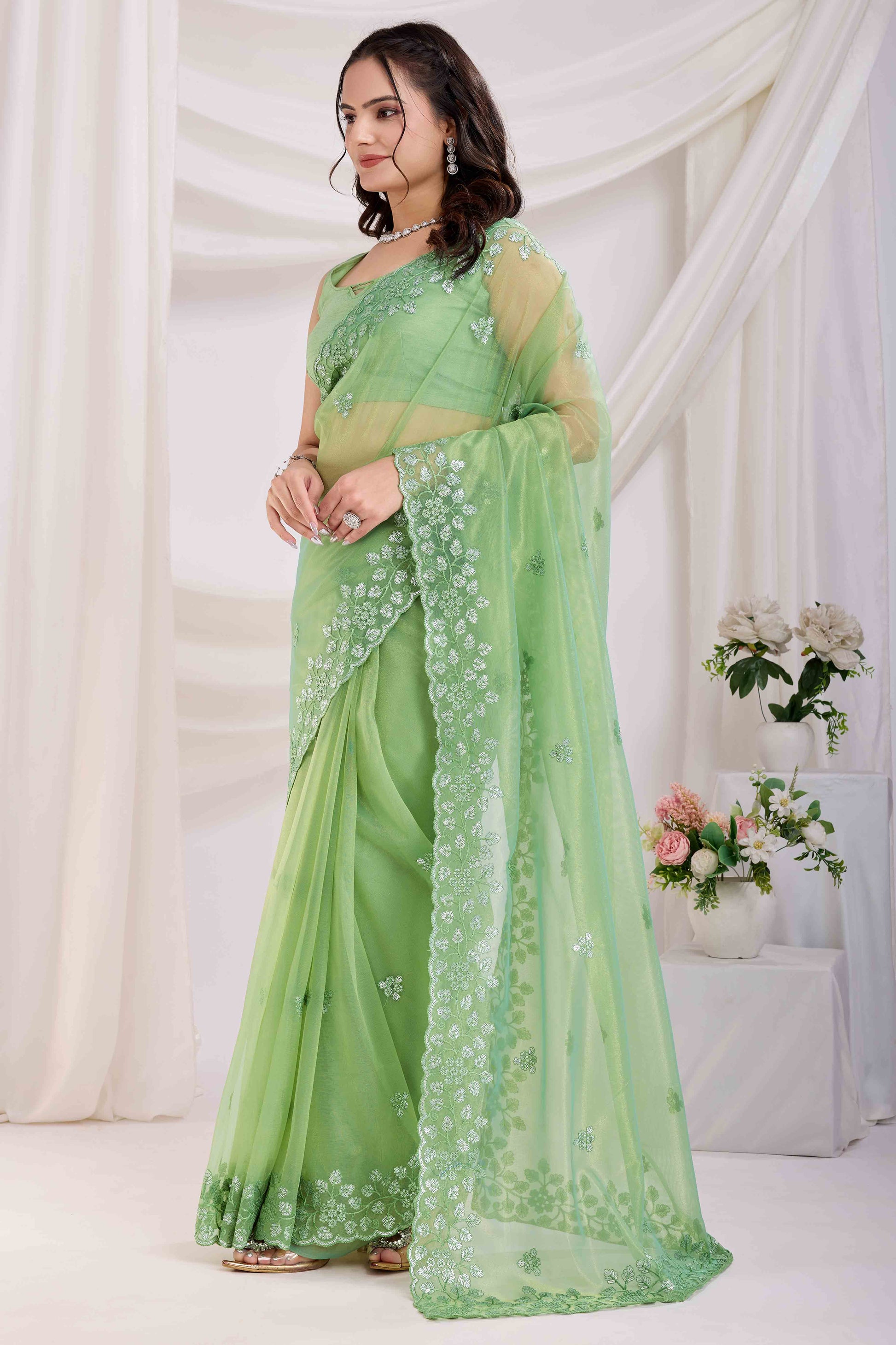 green-floral-sequins-embroidered-twill-net-saree-8