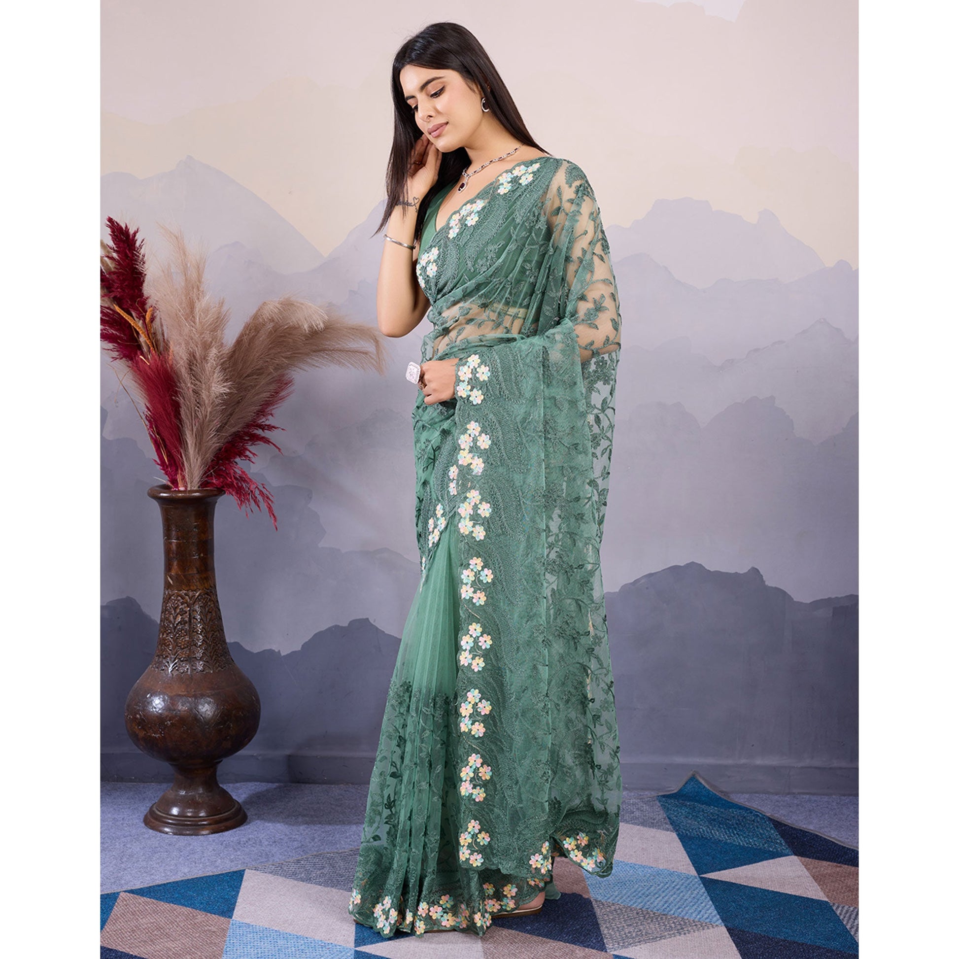 green-floral-thread-embroidered-net-saree