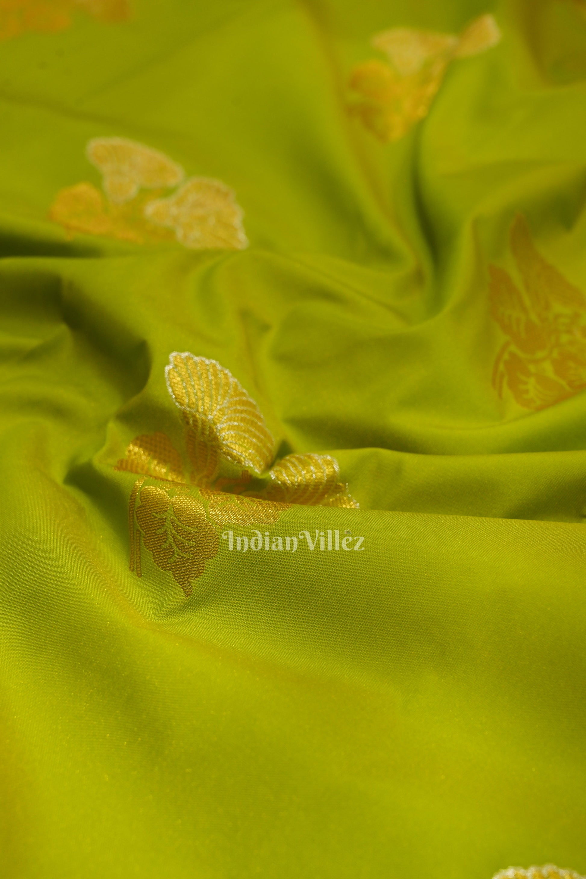 Parrot Green Brocade with Rani Pink Border Kanjivaram Silk Saree