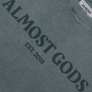 ALMOST GODS | STONEWASHED ALMOST GODS TEE IN GRANITE { GREY/CBLACK