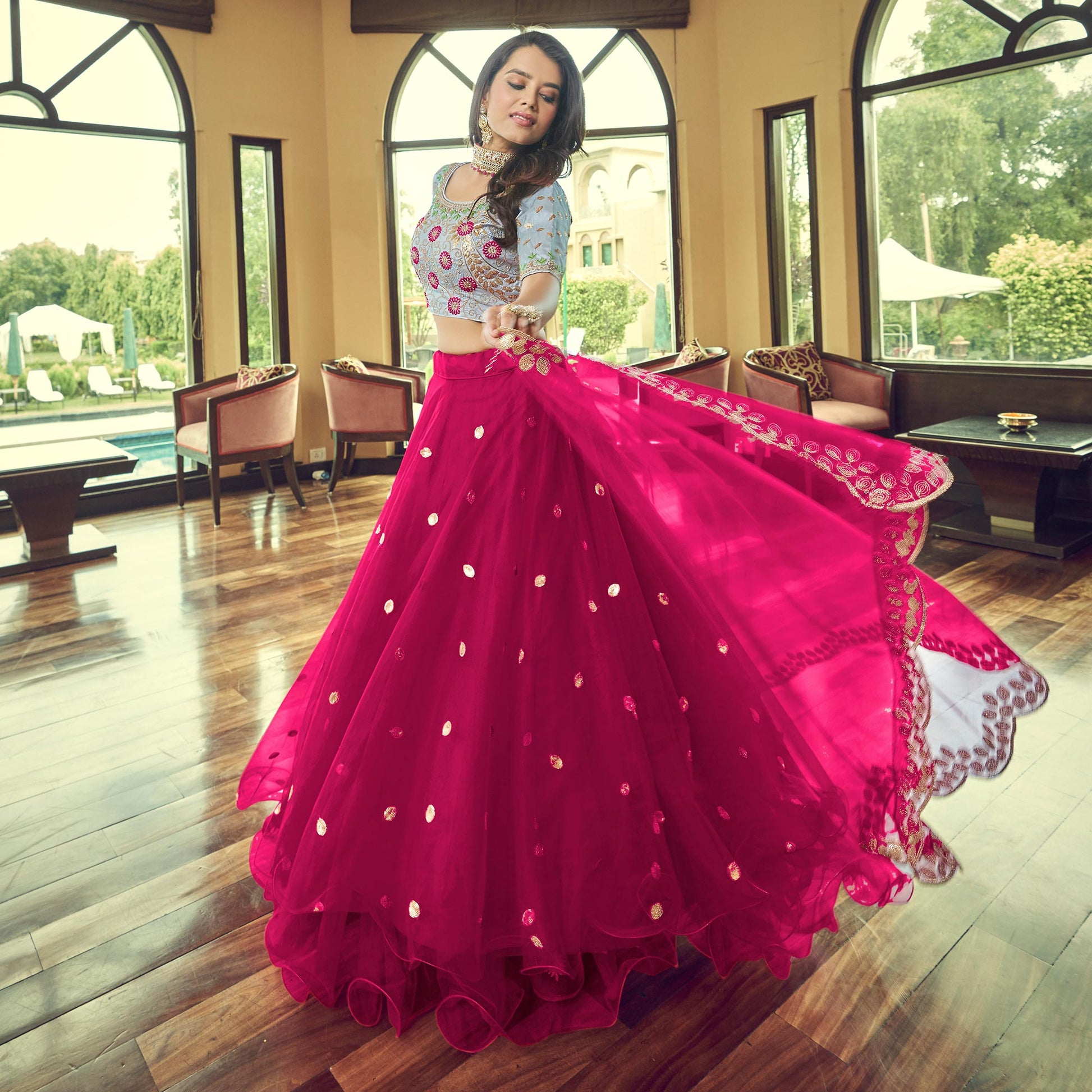 Dark Pink Sequins Embroidered Netted Lehenga Choli