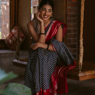 Indo Chanderi Cotton Saree with Screen-printed Floral Motifs in a striking red border
