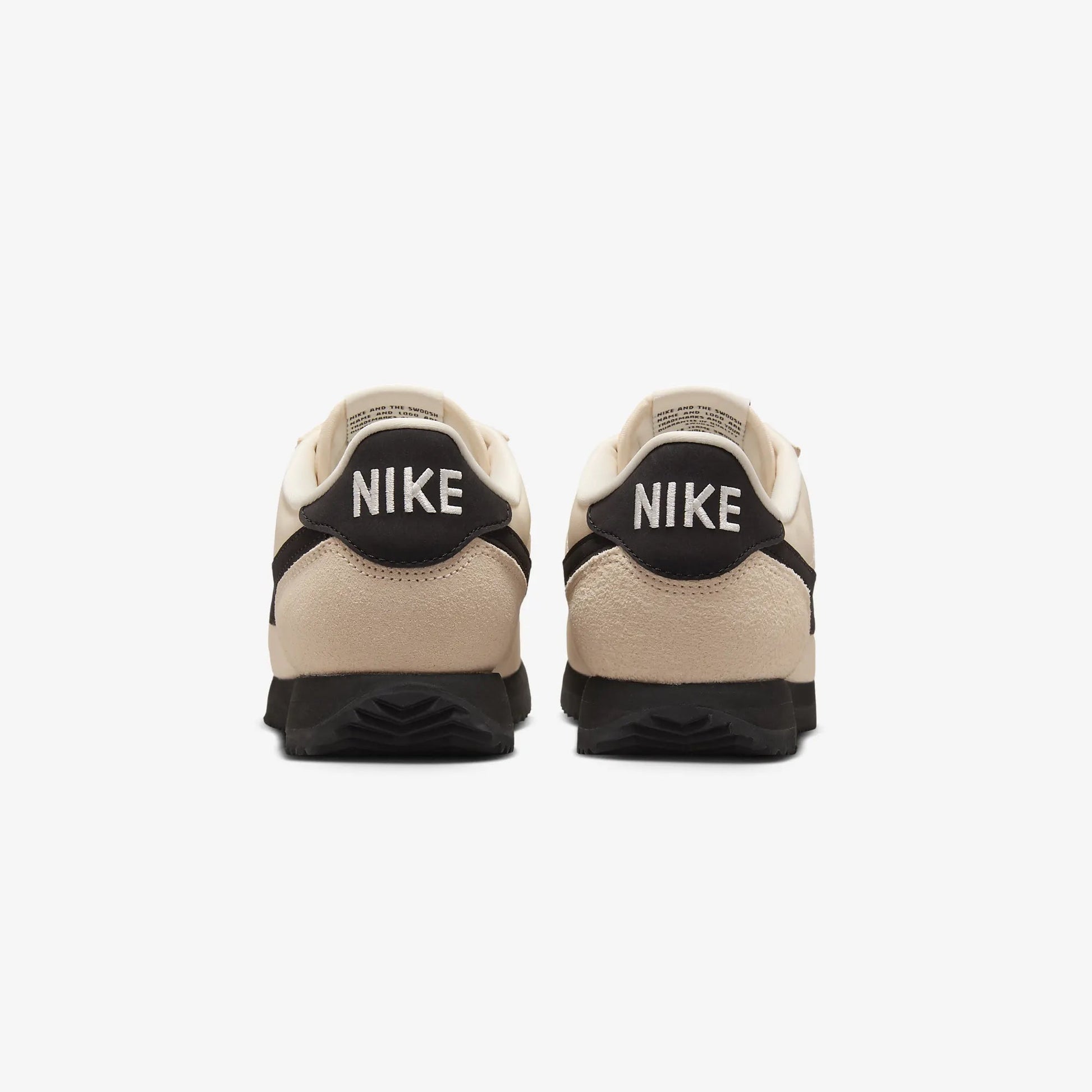 NIKE | CORTEZ TEXTILE { GUAVA ICE/BLACK-SAIL-PHANTOM